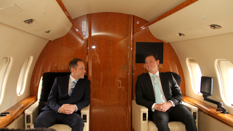 <p>Howard and Scott aboard one of the private jets&nbsp;</p>