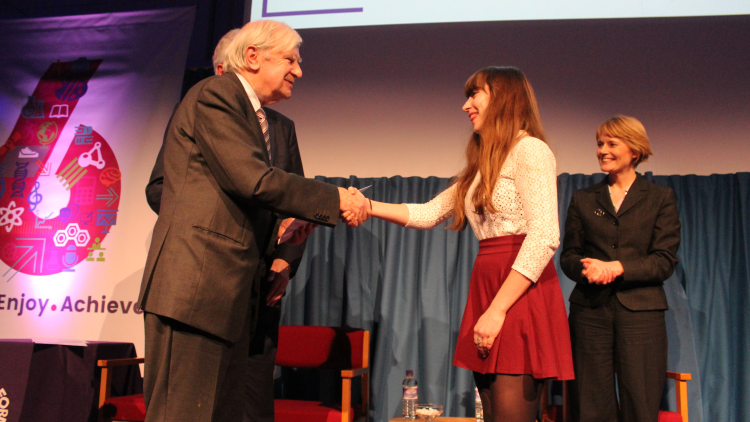 <p>Mr Green presenting Eilidh Reid with The Stephen Green Musical Volunteer of the Year Award</p>