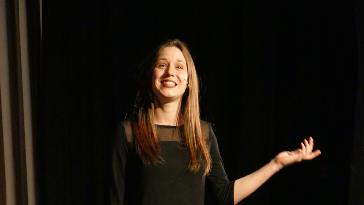 <p>Student Ella Stokes performing her LAMDA piece</p>