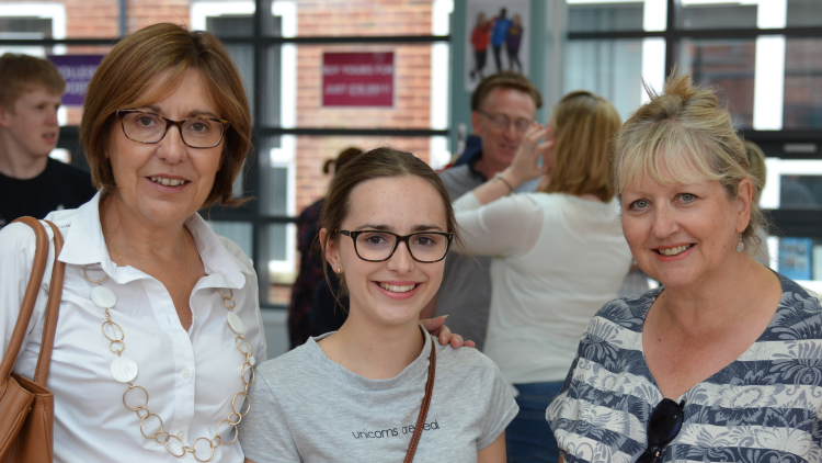 <p>Bethany Loveless, her mother and her subject tutor, Dianne Butler,&nbsp;celebrate at the College&nbsp;</p>