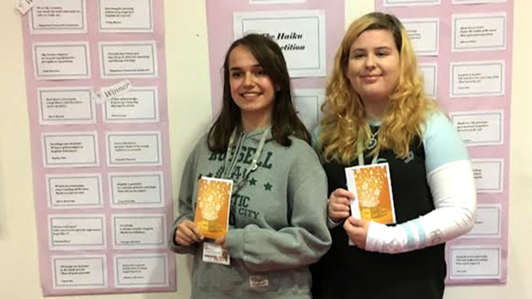 <p>&nbsp;Students&nbsp;Magdalena Ciesnowska-Jankowska and Olivia Lewry with their vouchers</p>