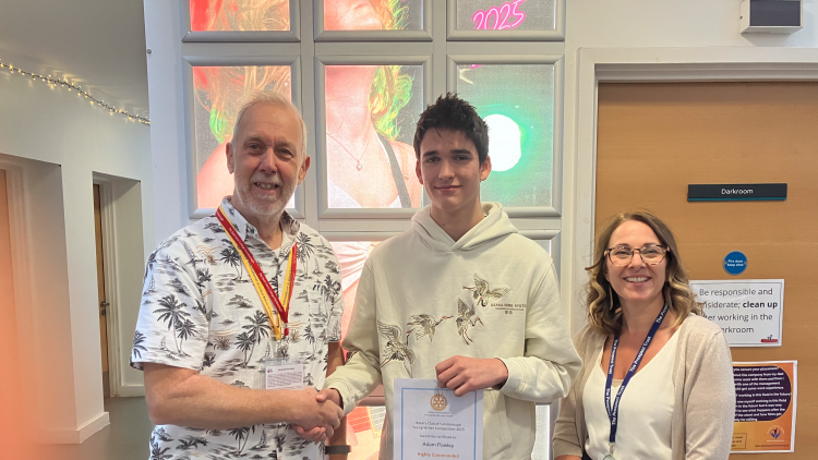 <p>Adam P receiving his certificate&nbsp;</p>
