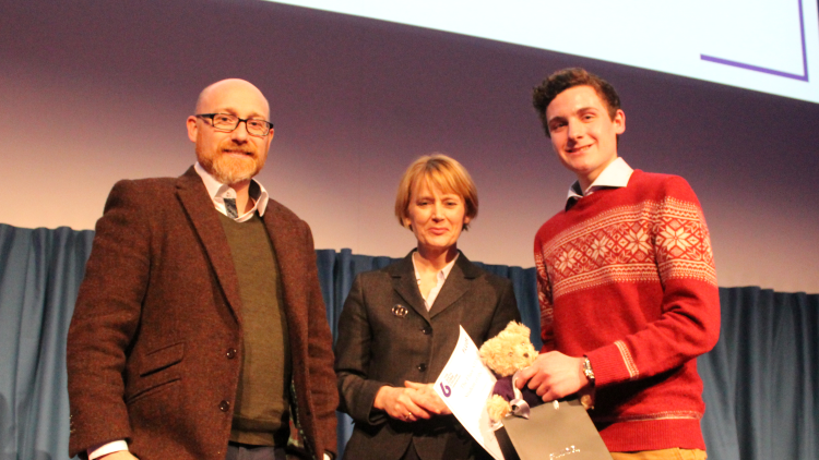 <p>Mike Riley presenting The Fluor STEM Student of the Year to Ethan Froome</p>