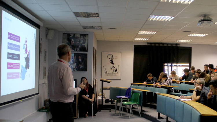 <p>Ann-Marie Hammond and Murray Croton from Capquest speaking to students about where they are based</p>