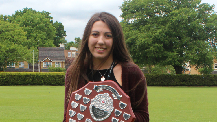 <p>Charlotte Ovens, receiving The Mike Ritchie Memorial Award for the women's swimming team</p>