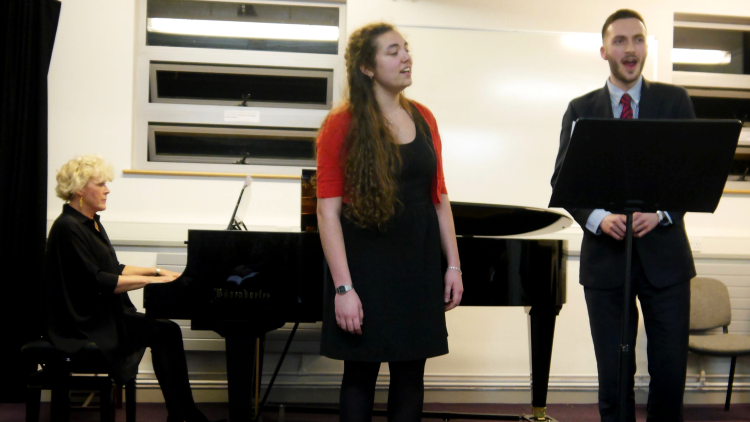 <p>Student Molly Beere performing with Richard Robbins accompanied on piano by Claire Tester</p>