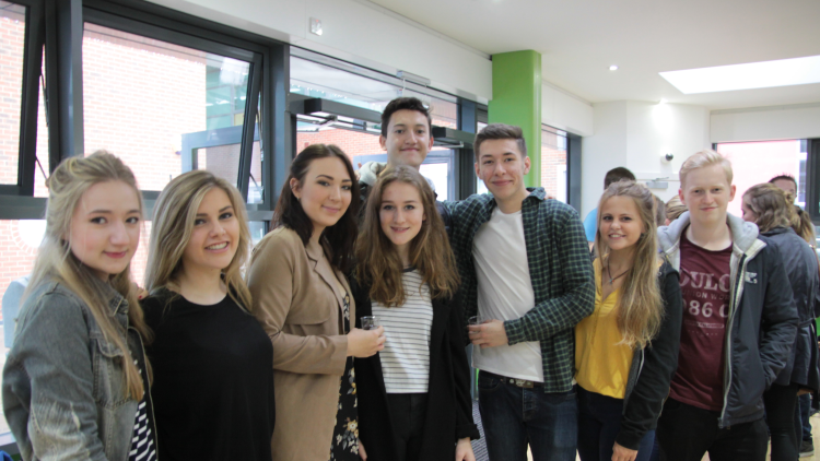 <p>&nbsp;Students celebrated in The Green House with teachers and parents</p>