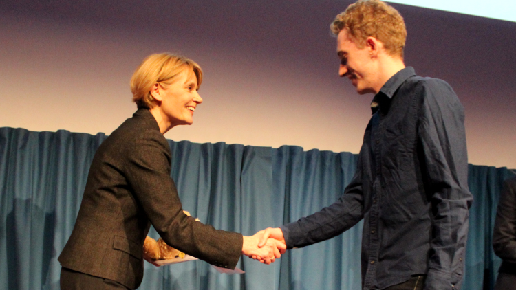 <p>Aidan Chapman receiving the Outstanding Academic Achievement Award&nbsp;</p>